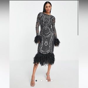 Beautiful Black sequence Asos dress with feathers